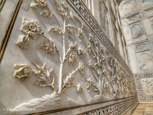 The floral designs on the walls of Taj Mahal.